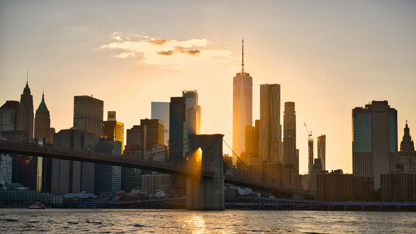 Lower Manhattan and the Brooklyn Bridge at sunset